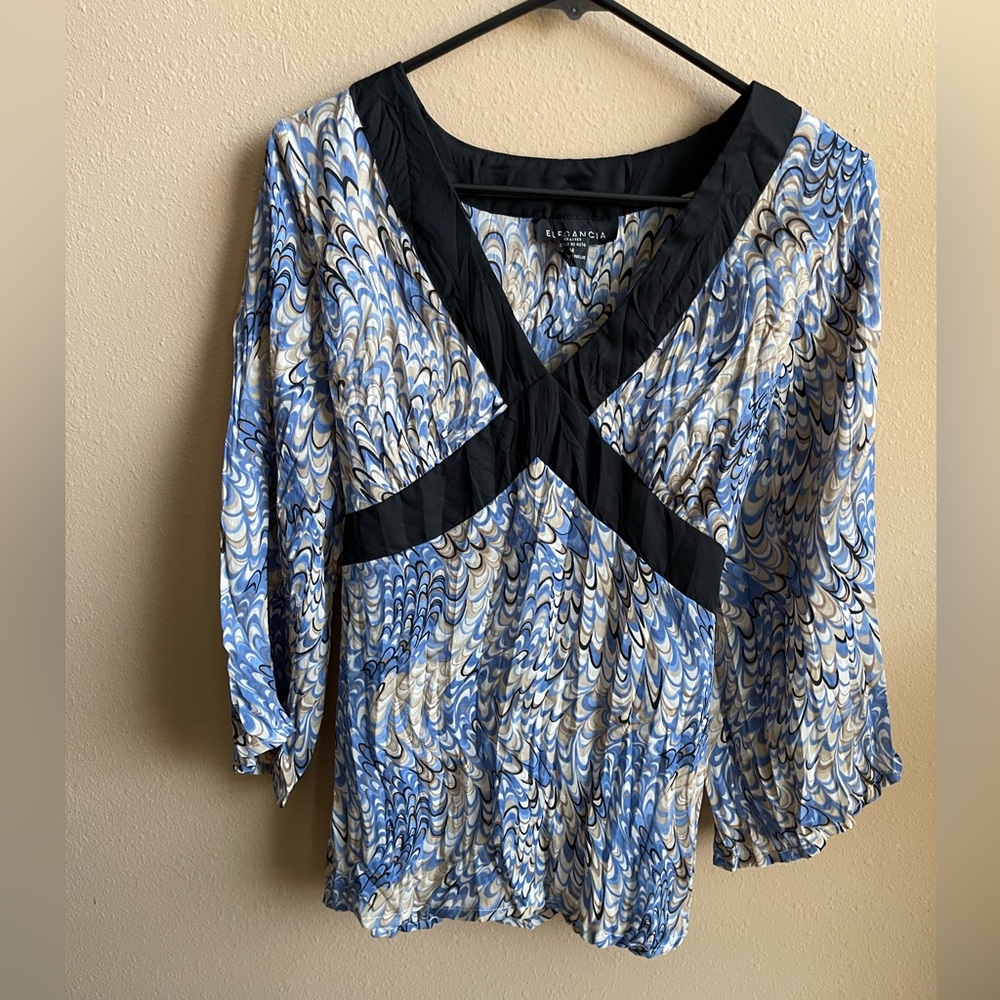 Elegancia Top.